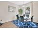 Elegant dining room with a glass table, six chairs, and a modern chandelier at 1613 Priory Cir, Winter Garden, FL 34787