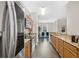 Well-equipped kitchen leading to a dining area, perfect for casual meals and entertaining guests at 1613 Priory Cir, Winter Garden, FL 34787