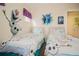 Playful bedroom with themed decor and two beds with themed bedding and colorful decor at 252 Julliard Blvd, Davenport, FL 33897