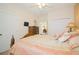 Comfortable bedroom with a decorative headboard and plenty of closet space at 252 Julliard Blvd, Davenport, FL 33897