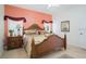 Comfortable bedroom with a ceiling fan, lamps, and decorative wall art at 252 Julliard Blvd, Davenport, FL 33897