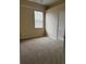 Neutrally painted bedroom featuring plush carpeting, a window, and closet space at 2705 Treymore Dr, Orlando, FL 32825