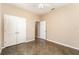 Bedroom featuring polished concrete floors, neutral paint, closet, ceiling fan, and open doorway at 2956 Whispering Trails Dr, Winter Haven, FL 33884