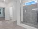 Bathroom featuring a modern tiled shower with glass enclosure and a view of the main bedroom at 3036 Country Side Dr, Apopka, FL 32712