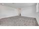 Spacious bedroom features neutral carpet and plenty of natural light at 3036 Country Side Dr, Apopka, FL 32712