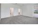 Large bedroom shows entrances to the bathroom and kitchen at 3036 Country Side Dr, Apopka, FL 32712