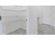 Walk-in pantry features metal shelving, providing ample storage at 3036 Country Side Dr, Apopka, FL 32712