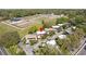 Community aerial view of the neighborhood with a sand volleyball court nearby at 601 W Old Us Highway 441 # 3-A, Mount Dora, FL 32757