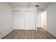 Bedroom featuring closet space and wood-look floors at 710 Saint Matthew Cir # 710, Altamonte Springs, FL 32714