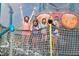 A group of play in the splash pad and water feature at the community water park at 7463 Marker Ave, Kissimmee, FL 34747