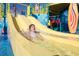 A enjoys the water slide at the community pool at 7479 Marker Ave, Kissimmee, FL 34747