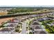 An aerial view of a neighborhood showcasing well-maintained homes, landscaping, and convenient access to nearby highways at 7483 Marker Ave, Kissimmee, FL 34747