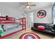 Fun bedroom featuring a Captain America theme and bunk beds at 7483 Marker Ave, Kissimmee, FL 34747