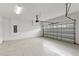 Spacious two car garage featuring a clean, epoxy-coated floor at 7483 Marker Ave, Kissimmee, FL 34747