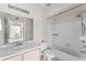 Clean bathroom with shower, tub, and sink at 14013 Fairway Island Dr # 434, Orlando, FL 32837