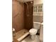 Bathroom featuring a walk-in shower, updated fixtures, and convenient grab bar at 165 Springwood Circle # A, Longwood, FL 32750