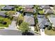 Aerial shot featuring a home with a screened-in pool, surrounded by well-manicured lawns at 1659 Cherry Blossom Ter, Lake Mary, FL 32746