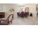 Light-filled dining area showcases a round table, six chairs, and a built-in hutch at 1659 Cherry Blossom Ter, Lake Mary, FL 32746