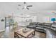 Spacious open floor plan featuring tile floors, dining area, and ample seating at 17411 Hillside Dr, Montverde, FL 34756