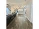 Open floor plan showcasing the flow from the living area to the dining and kitchen spaces at 17411 Hillside Dr, Montverde, FL 34756