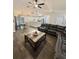 Spacious living room featuring modern décor, stylish furnishings, and plenty of natural light at 17411 Hillside Dr, Montverde, FL 34756