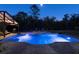 Backyard pool with a pavilion featuring outdoor seating, perfect for evening relaxation and entertaining at 1814 Old Stable Pt, Chuluota, FL 32766