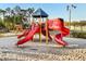 Community playground featuring a climbing structure with slides for active fun at 2030 Royal Bay Blvd # 62, Kissimmee, FL 34746