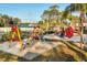 Colorful community playground with swings and slides, promoting outdoor activities for families at 2030 Royal Bay Blvd # 62, Kissimmee, FL 34746