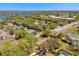 Stunning aerial view of a residential area showcasing beautiful homes, a lake, and lush greenery at 209 Camden Rd, Altamonte Springs, FL 32714