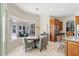 Breakfast nook with a view of outdoor dining area and a kitchen with stainless appliances at 2106 Ridgewind Way, Windermere, FL 34786