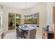 Breakfast nook with a view of pool and outdoor dining area at 2106 Ridgewind Way, Windermere, FL 34786