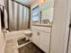 Bathroom featuring a tub, shower, granite countertop vanity, and modern fixtures at 2107 Cartgate Ln, Winter Haven, FL 33884