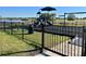 Community playground featuring slides, swings, and shade at 2107 Cartgate Ln, Winter Haven, FL 33884