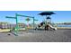 Community playground featuring slides, swings, and shade at 2107 Cartgate Ln, Winter Haven, FL 33884