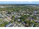 Scenic aerial view showing the location of the property within a tranquil, tree-filled suburb at 2108 Delaney Ave, Orlando, FL 32806