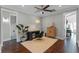 Bedroom featuring hardwood floors, a ceiling fan, and a neutral color scheme at 2108 Delaney Ave, Orlando, FL 32806