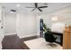 Bedroom showcasing hardwood floors, a ceiling fan, and natural light at 2108 Delaney Ave, Orlando, FL 32806