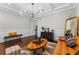 Stylish living room featuring hardwood floors, modern lighting, and contemporary decor at 2108 Delaney Ave, Orlando, FL 32806