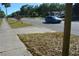 Street view with a well-maintained sidewalk, street, and various vehicles, providing context of the area at 2525 S Sanford Avenue Ave, Sanford, FL 32773