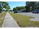 Street view featuring sidewalk, street, landscaping, and neighborhood, offering a glimpse of the community at 2525 S Sanford Avenue Ave, Sanford, FL 32773