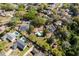 Aerial view of a home with a backyard pool in a neighborhood, highlighting its setting and amenities at 2661 Jennifer Hope Blvd, Longwood, FL 32779