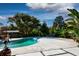 Inviting backyard pool with lounge chairs, perfect for relaxation and outdoor entertaining at 2661 Jennifer Hope Blvd, Longwood, FL 32779