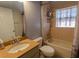 Bathroom featuring a shower/tub combo and a vanity with a sink at 2904 Sweetspire Cir, Kissimmee, FL 34746