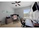 Well lit home office with neutral walls and a modern ceiling fan, perfect for working remotely at 3616 Indian Trl, Eustis, FL 32726