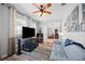 View of the living room showing the entrance to the dining room and the hardwood floor at 3616 Indian Trl, Eustis, FL 32726