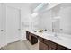 Double vanity bathroom includes white quartz countertop and modern fixtures at 4405 Durga Ln, Kissimmee, FL 34746