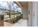 Cozy front porch with stone accents and iron railings provides a welcoming entrance at 4409 Summer Flowers Pl, Kissimmee, FL 34746