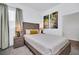 Bedroom featuring neutral paint, carpet and trim, a bedside table with lamps, and closet at 4421 Durga Ln, Kissimmee, FL 34746