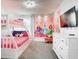 Princess themed bunk bedroom with twin over full bunkbeds and dresser at 2859 Bookmark Dr, Kissimmee, FL 34746