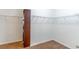 This walk-in closet features plenty of shelving and clothes storage space at 4770 Cypress Forest Ln, St Cloud, FL 34772